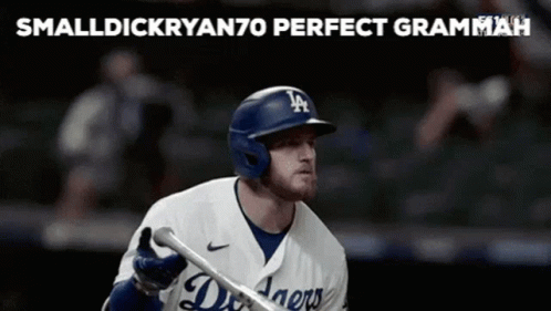 Man in Dodgers Baseball Uniform and Helmet
