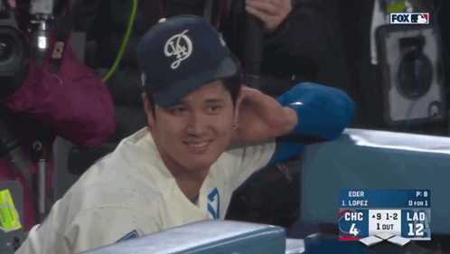 Man in Dodgers Hat in Stands