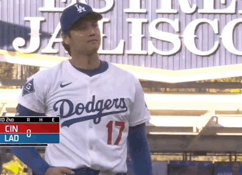 Man in Dodgers Jersey in Front of Jalisco Sign