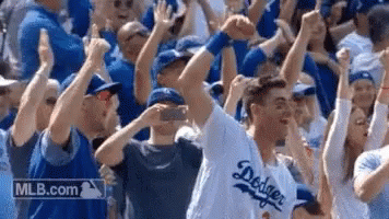 Man in Dodgers Jersey Taking Photo