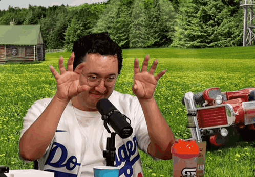 Man in Dodgers Shirt Giving Peace Sign