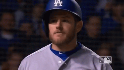 Man in Dodgers Uniform and Helmet