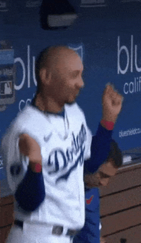 Man in Dodgers Uniform Dancing