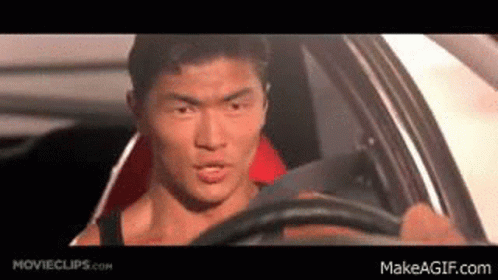 Man in Driver's Seat Looking Out Window