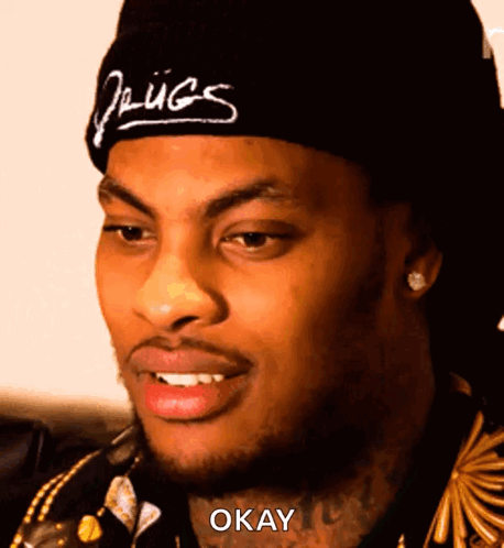 Man in Drugs Beanie Saying Okay