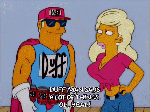 Man In Duff Shirt Talking To Woman In Pink GIF