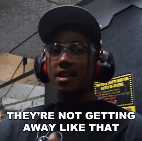 Man in Ear Muffs and Hat Saying They're Not Getting Away Like That