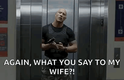 Man in Elevator Holding Gun Asking About Wife