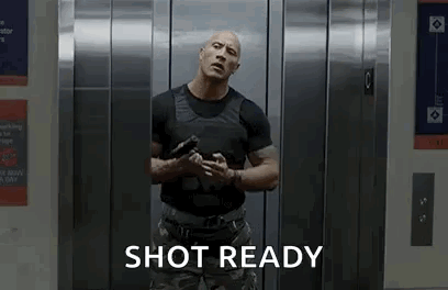 Man In Elevator Holding Gun Saying Shot Ready GIF