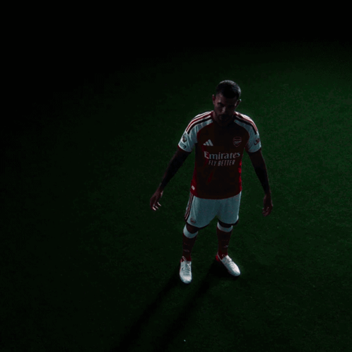Man in Emirates Fly Better Jersey on Field