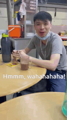 Man in Face Mask With Coffee Saying Hmm Wahahahaha