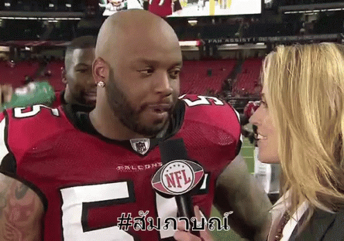 Man In Falcons Jersey Being Interviewed GIF