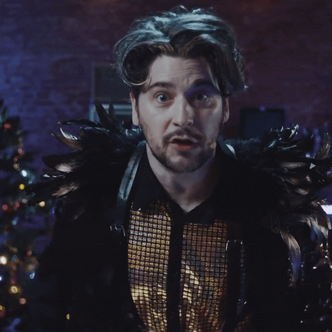 Man In Feathered Costume Surprised Whaaaa GIF