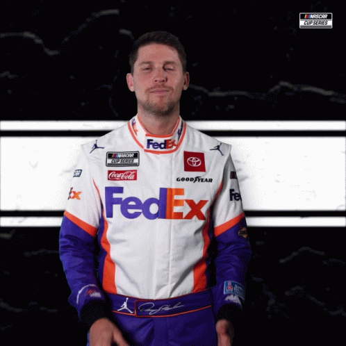 Man in FedEx Racing Uniform Making Face
