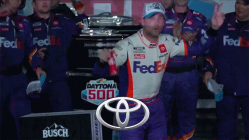 Man in FedEx Uniform Holding Soda