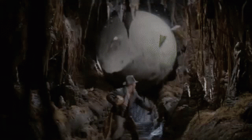 Man in Fedora Running Through Tunnel
