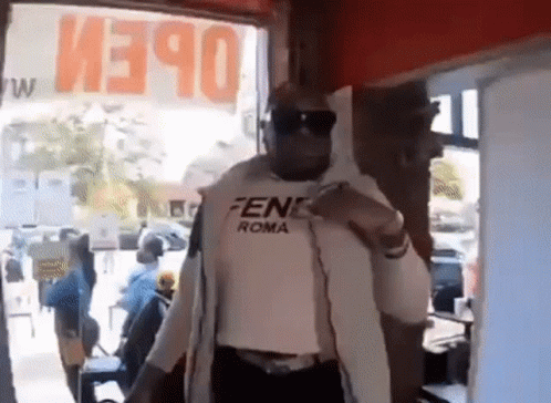 Man in Fendi Roma Shirt