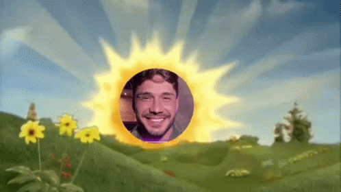 Man in Field With Sun in Background