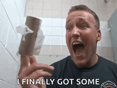 Man in Fire Dept Shirt Holding Toilet Paper Saying I Finally Got Some