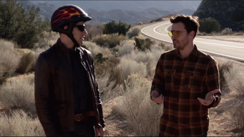 Man in Flame Helmet Talking