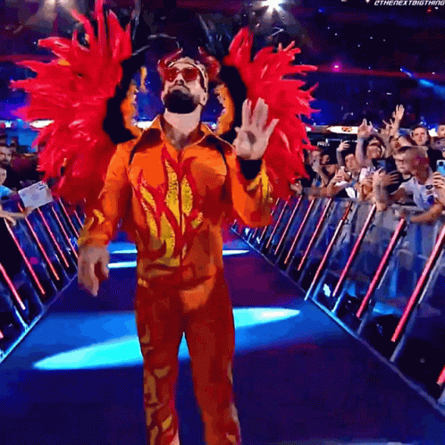 Man in Flaming Costume Walking Down Hallway