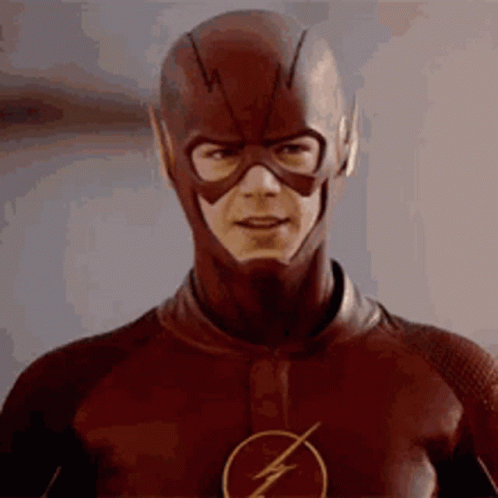 Man in Flash Costume Looking at Camera