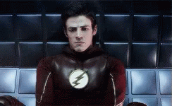 Man in Flash Costume Sitting