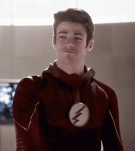 Man In Flash Costume Smiling GIF
