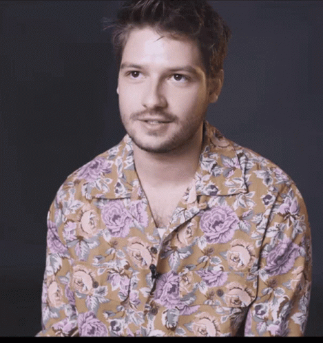 Man in Floral Purple Shirt