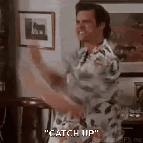 Man in Floral Shirt Dancing Holding Framed Picture