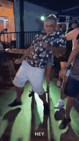 Man in Floral Shirt Dancing