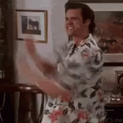Man in Floral Shirt Dancing