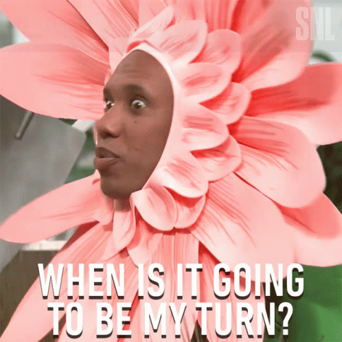 Man In Flower Costume Asking When His Turn GIF