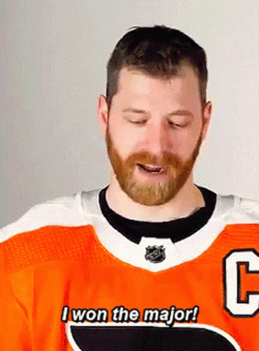 Man in Flyers Jersey Giving Thumbs Down