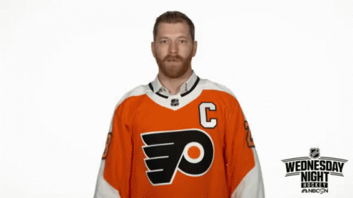 Man in Flyers Jersey Thumbs Down