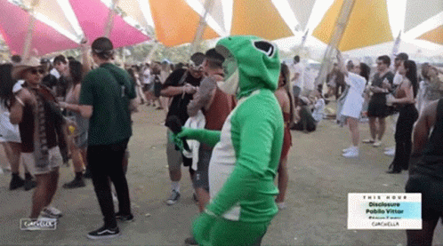 Man In Frog Costume Dancing At Festival GIF