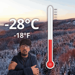 Man In Front Of 28-Degree Thermometer GIF