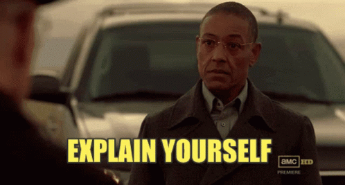 Man in Front of Car Saying Explain Yourself