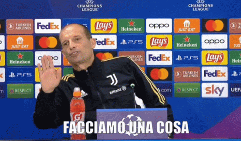 Man in Front of Champions League Ad