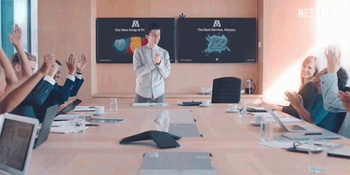 Man in Front of Conference Room With Netflix Advertisement