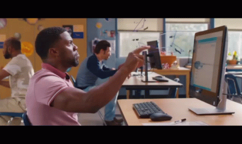 Man in Front of Dell Computer