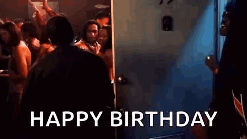 Man in Front of Door Saying Happy Birthday