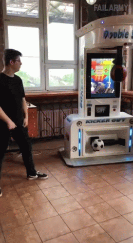 Man in Front of Double Kicker Out Machine