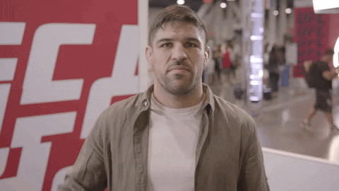 Man In Front Of FC Sign GIF