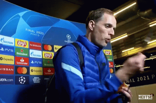 Man in Front of Final 2021 Porto Sign
