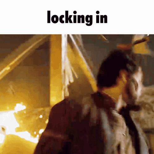 Man in Front of Fire Saying Locking In