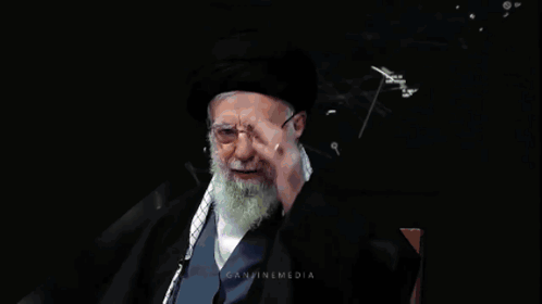 Man in Front of Flags Hero Imam Khamenei