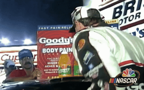 Man in Front of Goody's Body Pain Medicine Box