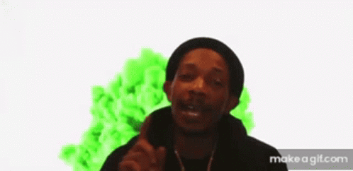 Man in Front of Green Smoke Explosion
