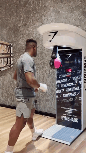 Man in Front of Gymshark Machine